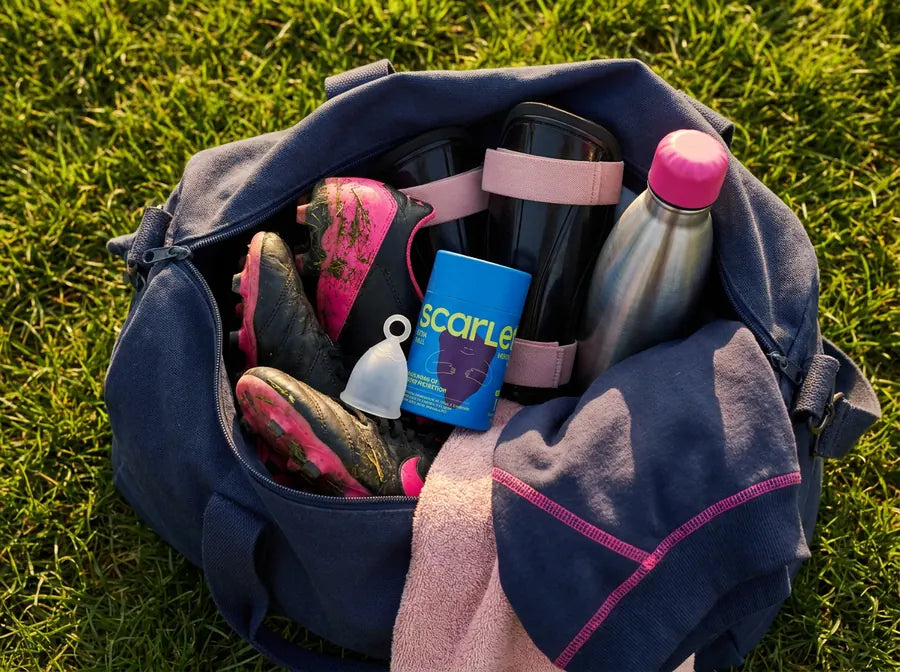 The Scarlet X-Small cup and case in a sports duffel