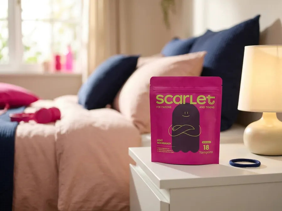 Scarlet tampons on a bedroom nightstand