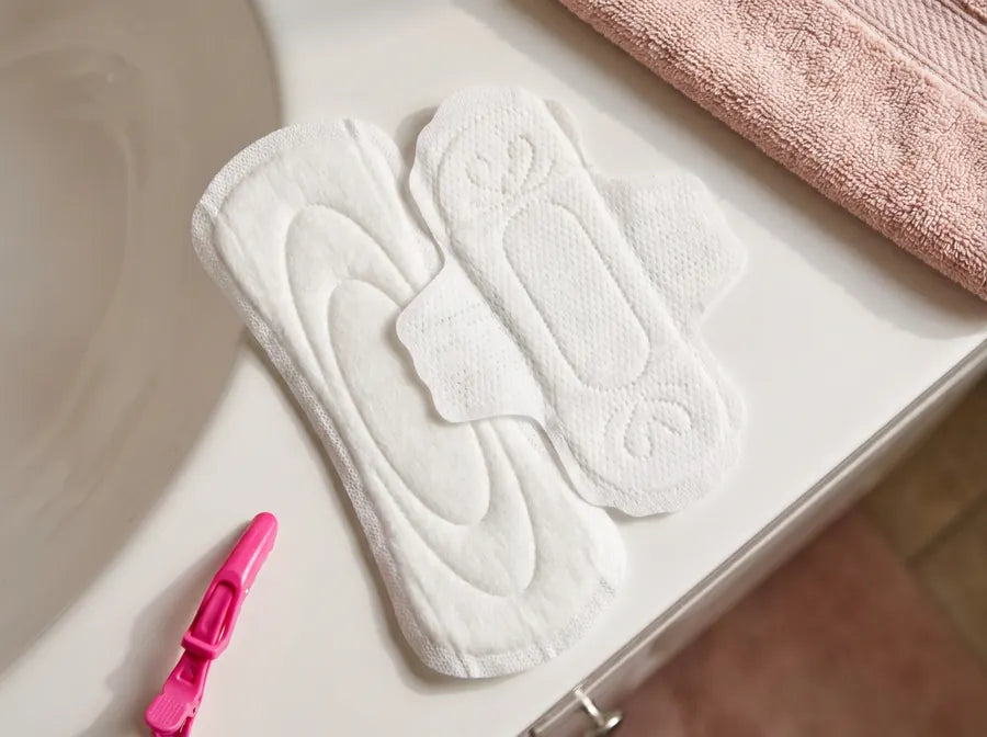 A long store pad next to a smaller Scarlet pad
